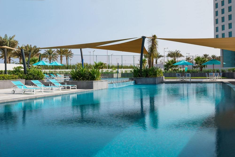Bay La Sun Hotel And Marina - Emaar King Abdullah Economic City Exterior photo The swimming pool at the hotel